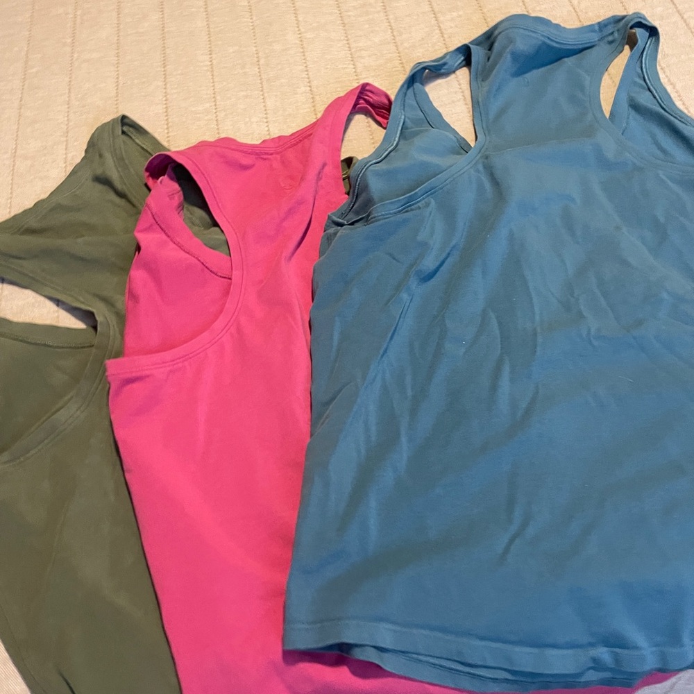 THREE Lululemon soft colored tank tops